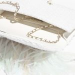 Chanel-Feather-and-Pearl-Clutch-1.jpg