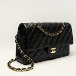 Chanels-iconic-11.12-lambskin-black-handbag-1.jpg